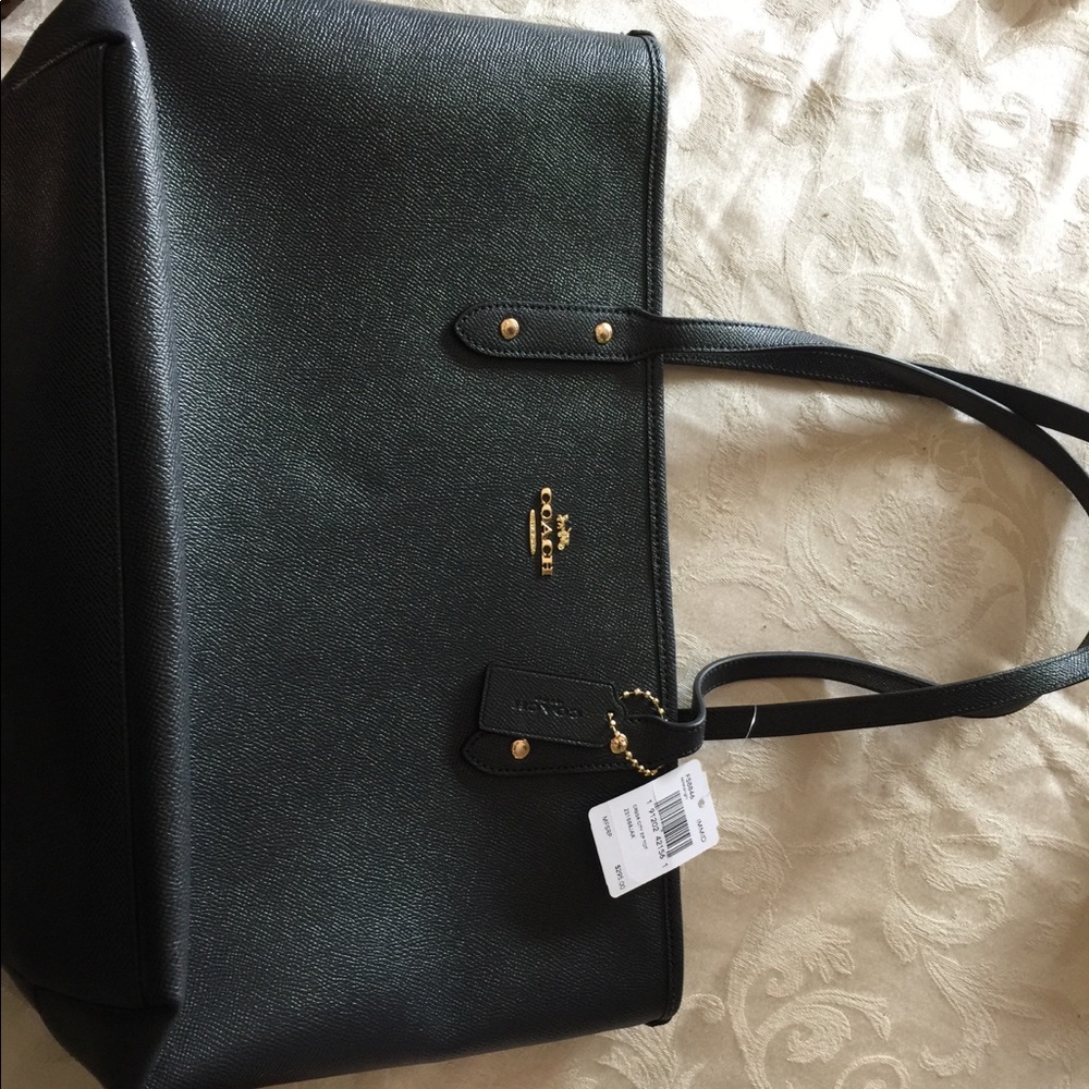 Brand new with tags, navy in color Coach tote